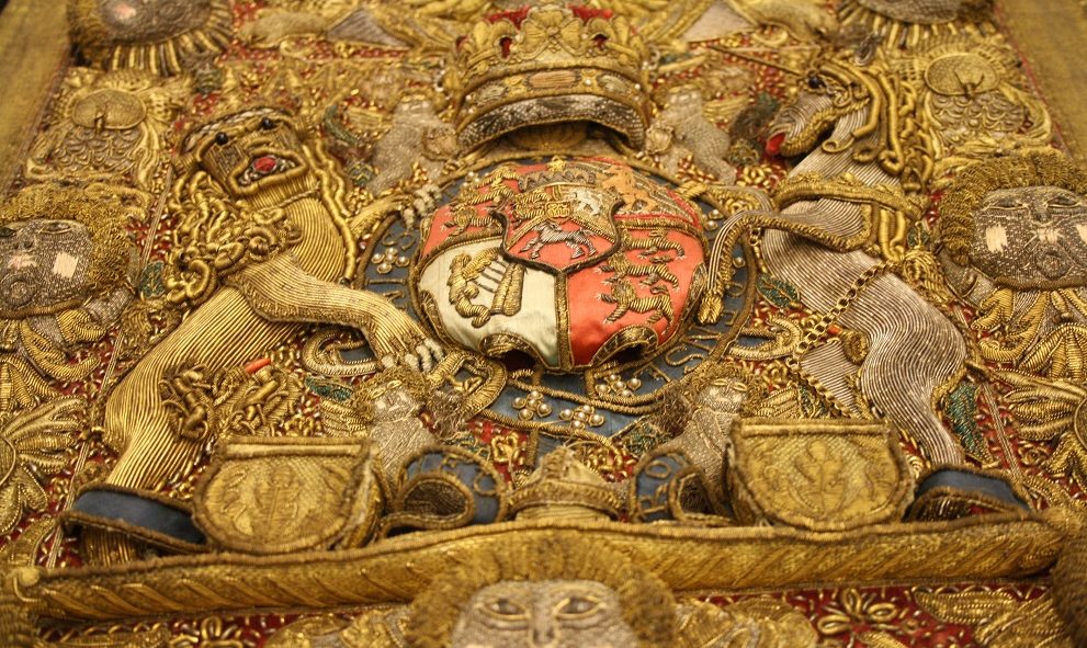 Detail from the coat of arms of King George IV on a Lord Chancellor's purse from the archives of Lincoln's Inn