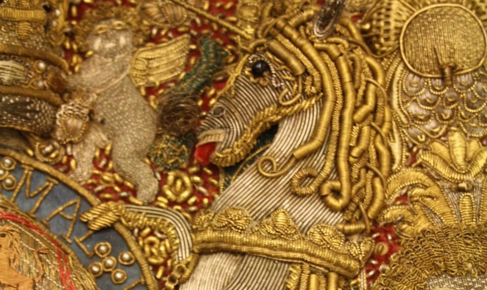 Detail from the coat of arms of King George IV on a Lord Chancellor's purse from the archives of Lincoln's Inn