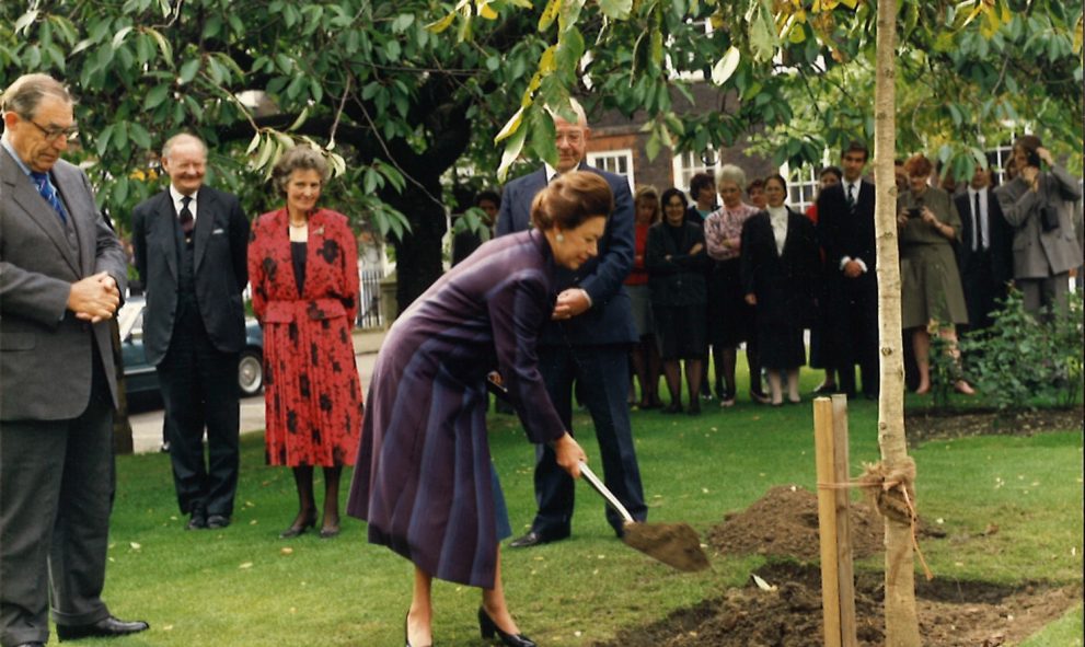 Princess Margaret, Royal Bencher of Lincoln's Inn, planting a walnut tree in the gardens on 5 October 1988