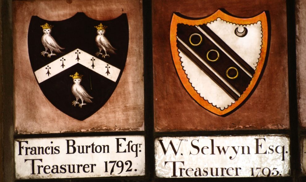 2 coats of arms of past Treasurers in stained glass
