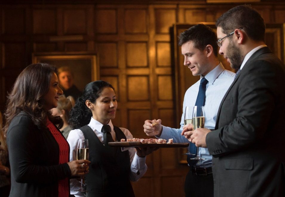 Group of people having drinks and canapes at a Lincoln's Inn event