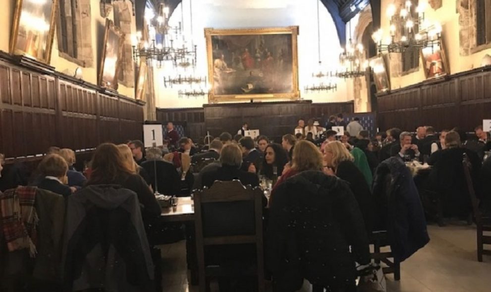 quiz teams at numbered tables in the Old Hall